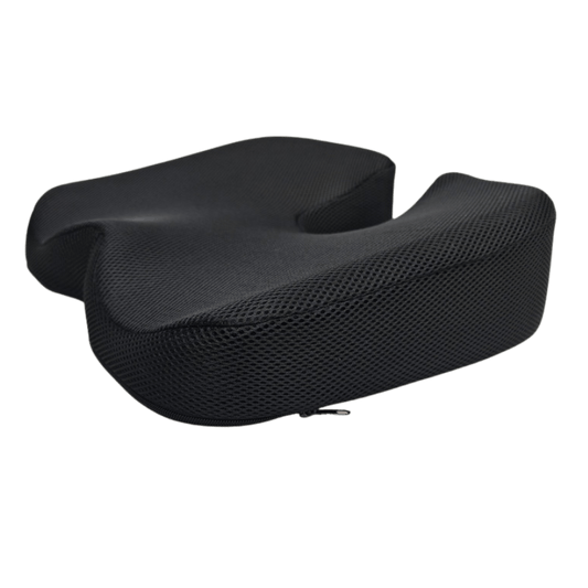 A black cushion designed for ergonomic support, featuring a textured surface and a cutout in the center for seating.